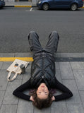 DAXUEN dark grey wide-leg cargo pants with woven strap detail — model photo