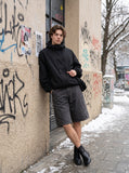DAXUEN Wide-leg cargo shorts in light greige and dark charcoal grey — model photo