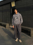 DAXUEN Wide-leg cropped trousers for men — model photo