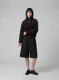 DAXUEN Men's wide-leg culotte shorts in solid colors — model photo