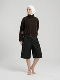 DAXUEN Men's wide-leg culotte shorts in solid colors — model photo