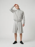 DAXUEN Wide-leg knee-length culotte shorts with belt — model photo