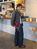 DAXUEN Wide-leg dark denim pants with embroidery — model photo
