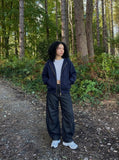 DAXUEN Wide-leg dark denim pants with embroidery — model photo