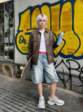 DAXUEN Men's wide-leg denim cargo shorts — model photo
