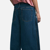 DAXUEN Wide-leg denim jeans with sash — model photo