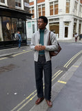DAXUEN Wide-leg denim pants with slits and contrasting stitching — model photo