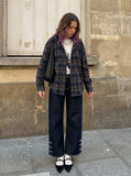 DAXUEN Wide-leg denim pants with slits and contrasting stitching — model photo
