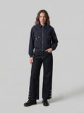 DAXUEN Wide-leg denim pants with slits and contrasting stitching — model photo