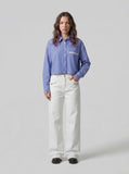 DAXUEN Wide-leg denim trousers in dark indigo, white, and black — model photo