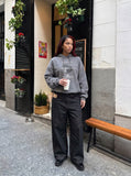 DAXUEN Wide-leg denim trousers with red stitching — model photo