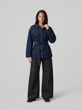DAXUEN Wide-leg denim trousers with red stitching — model photo