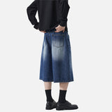 DAXUEN Pair of wide-leg distressed denim shorts
