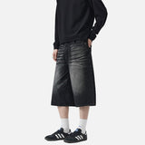 DAXUEN Pair of wide-leg distressed denim shorts