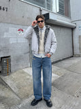 DAXUEN Wide-leg distressed denim trousers — model photo
