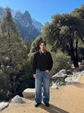 DAXUEN Wide-leg distressed denim trousers — model photo