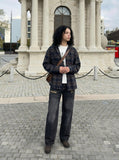 DAXUEN Wide-leg distressed denim trousers — model photo