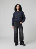 DAXUEN Wide-leg distressed denim trousers — model photo