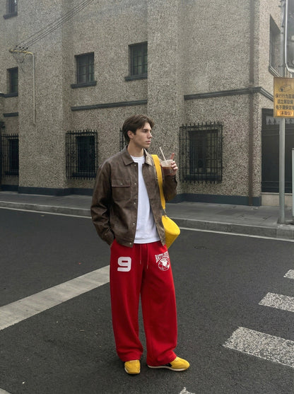 DAXUEN Wide-leg sweatpants with graphic designs — model photo