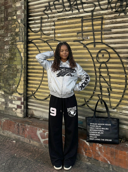 DAXUEN Wide-leg sweatpants with graphic designs — model photo