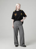 DAXUEN grey and black wide-leg draped pants — model photo