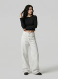 DAXUEN High-waisted wide-leg pants in solid black and white — model photo
