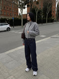 DAXUEN Wide-leg indigo jeans with contrast stitching and embroidery — model photo