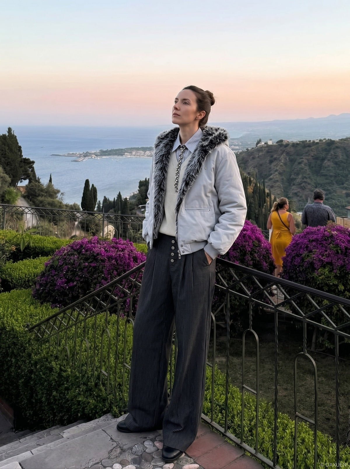 DAXUEN Wide-leg pinstripe trousers in dark charcoal grey — model photo