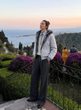DAXUEN Wide-leg pinstripe trousers in dark charcoal grey — model photo