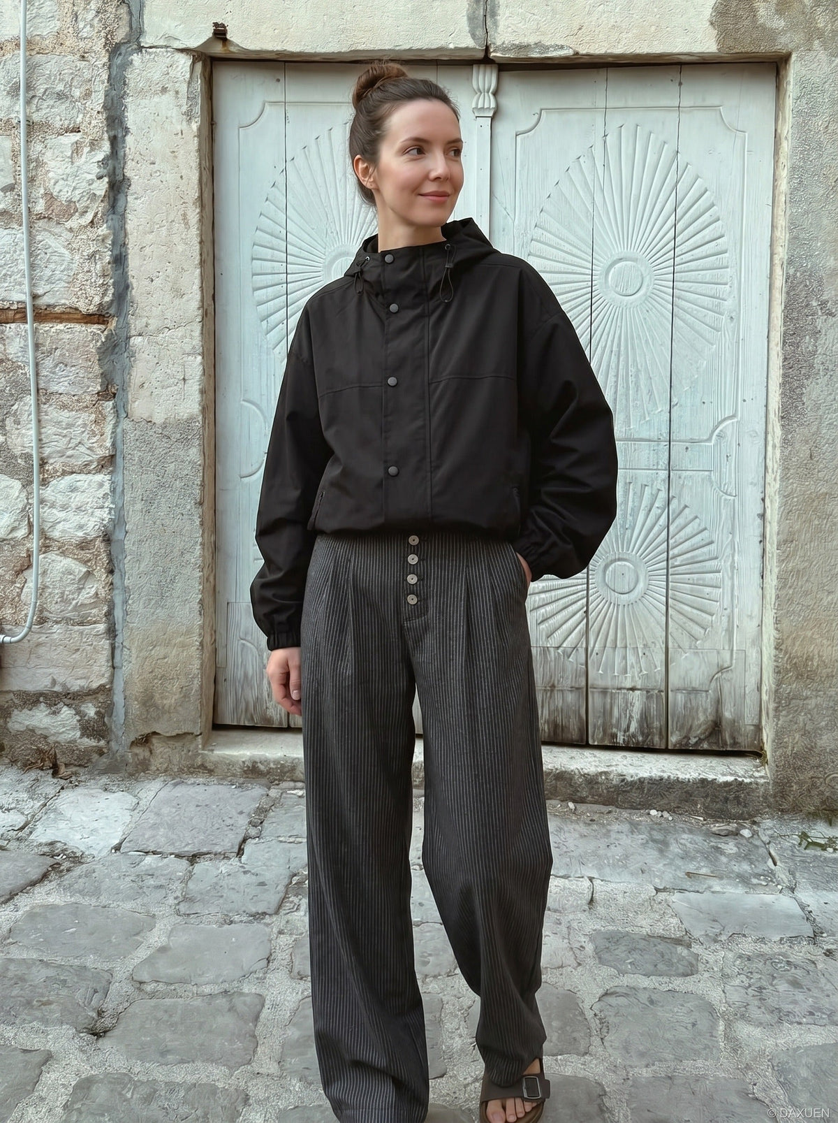 DAXUEN Wide-leg pinstripe trousers in dark charcoal grey — model photo