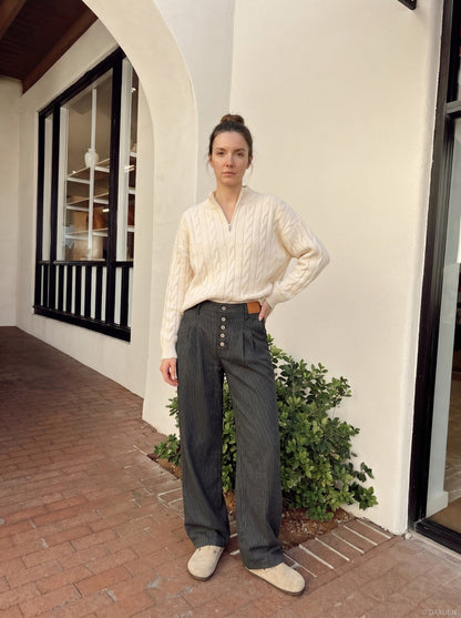 DAXUEN Wide-leg pinstripe trousers in dark charcoal grey — model photo