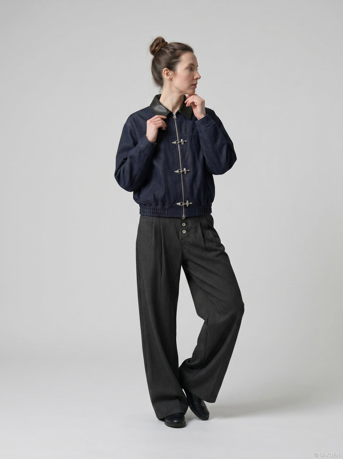 DAXUEN Wide-leg pinstripe trousers in dark charcoal grey — model photo