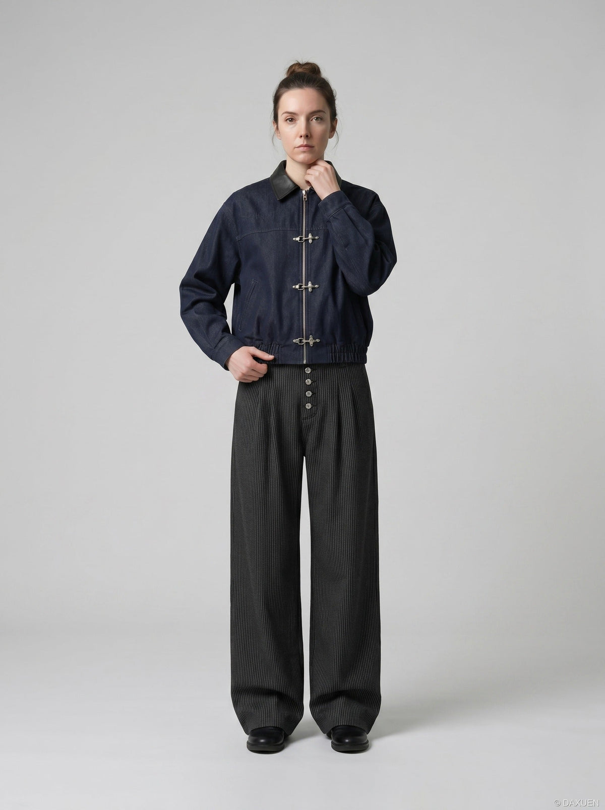 DAXUEN Wide-leg pinstripe trousers in dark charcoal grey — model photo
