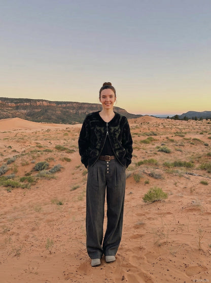 DAXUEN Wide-leg pinstripe trousers in dark charcoal grey — model photo