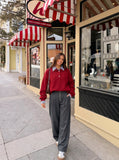 DAXUEN Wide-leg pinstripe trousers in dark charcoal grey — model photo