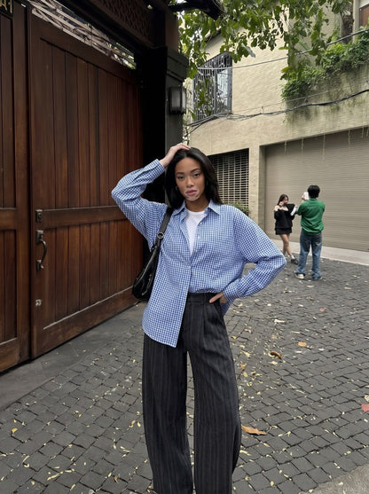 DAXUEN Wide-leg pinstripe trousers in dark grey — model photo