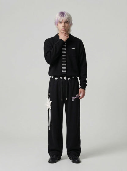 DAXUEN Wide-leg sweatpants with star graphics and keychain — model photo