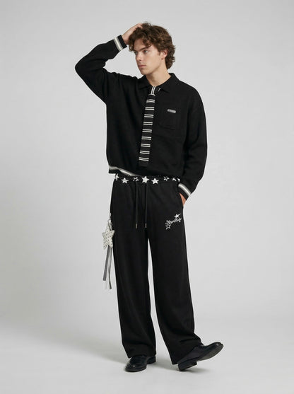 DAXUEN Wide-leg sweatpants with star graphics and keychain — model photo
