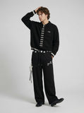 DAXUEN Wide-leg sweatpants with star graphics and keychain — model photo