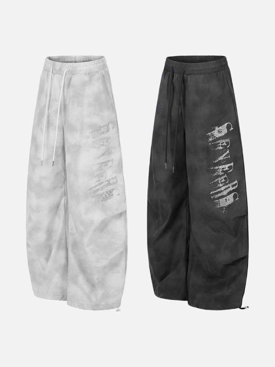 DAXUEN Wide-leg pants with studded graphic design