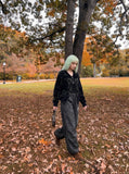 DAXUEN Wide-leg pants with studded graphic design — model photo