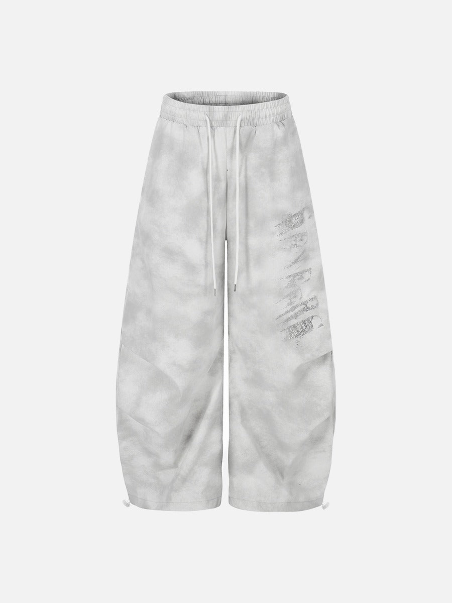 DAXUEN Wide-leg pants with studded graphic design