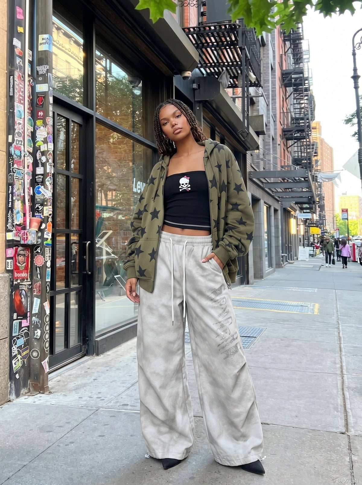 DAXUEN Wide-leg pants with studded graphic design — model photo