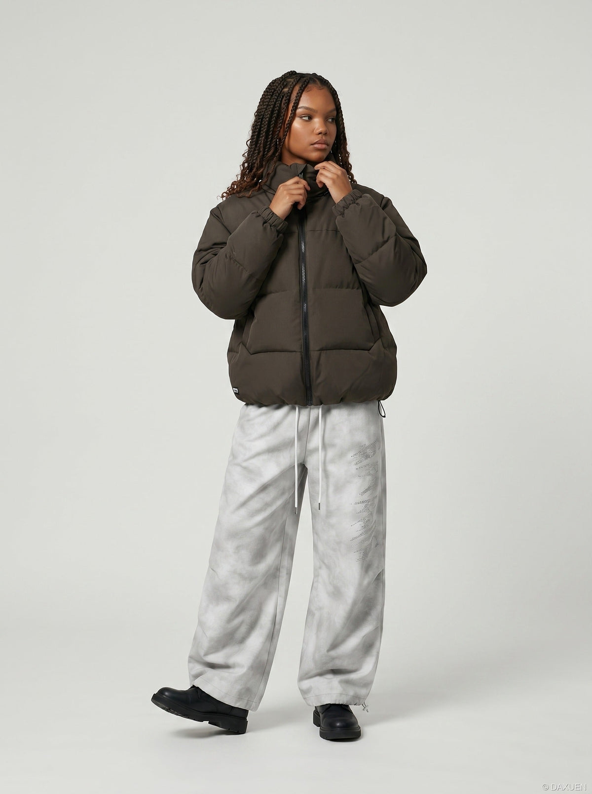 DAXUEN Wide-leg pants with studded graphic design — model photo
