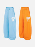 DAXUEN Wide-leg sweatpants with graphic print