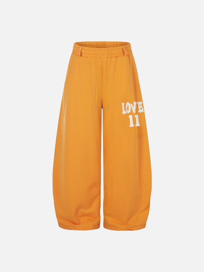 DAXUEN Wide-leg sweatpants with graphic print