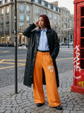 DAXUEN Wide-leg sweatpants with graphic print — model photo