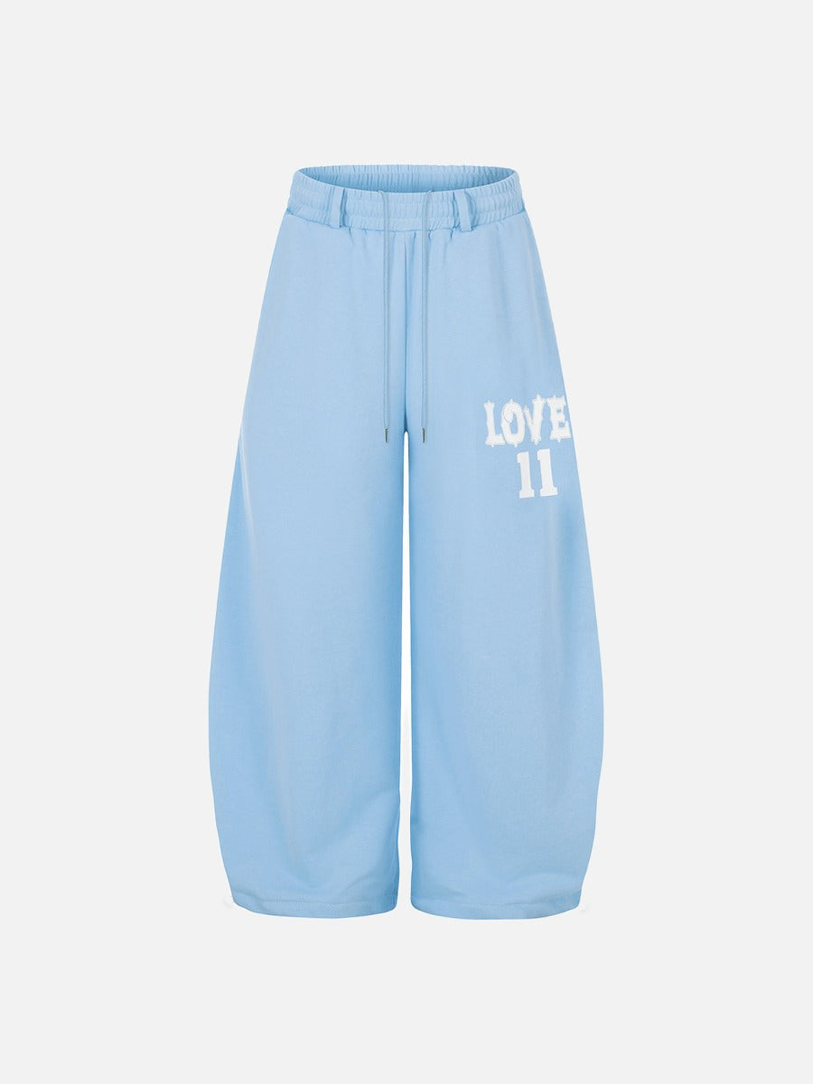 DAXUEN Wide-leg sweatpants with graphic print