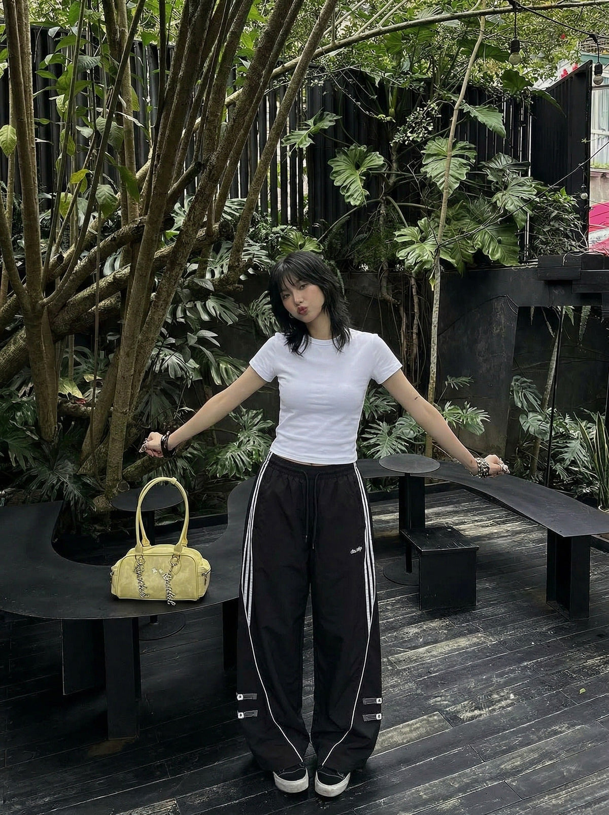 DAXUEN Wide-leg track pants in solid colors — model photo