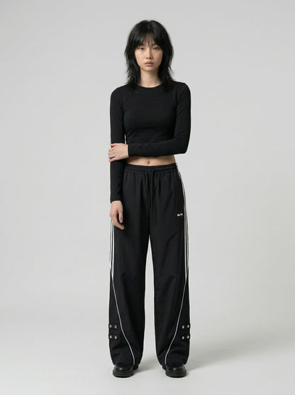 DAXUEN Wide-leg track pants in solid colors — model photo